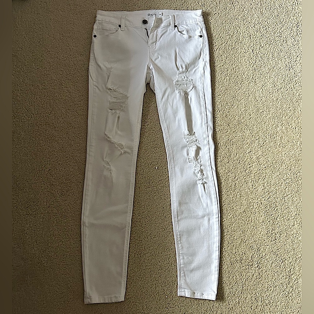 Ripped white denim jeans